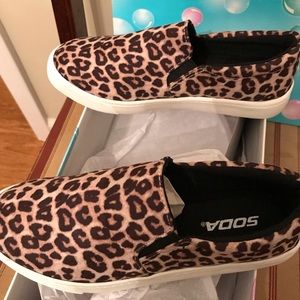 Soda Reign cheetah closed toe slip on shoe